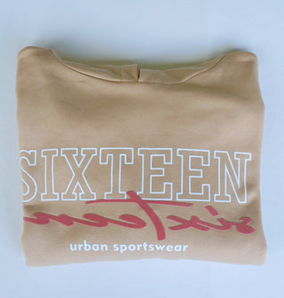 Rosa oversized Cropped Sweatshirt für Damen von 16sports, lockere Passform, bequem und modisch, auf einem weißen Hintergrund.