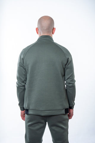 Schwarze 16sports 1616 TeamWear Jacke aus Sweatstoff, sportliches Design, ideal für Outdoor-Aktivitäten, sichtbarer Reißverschluss.